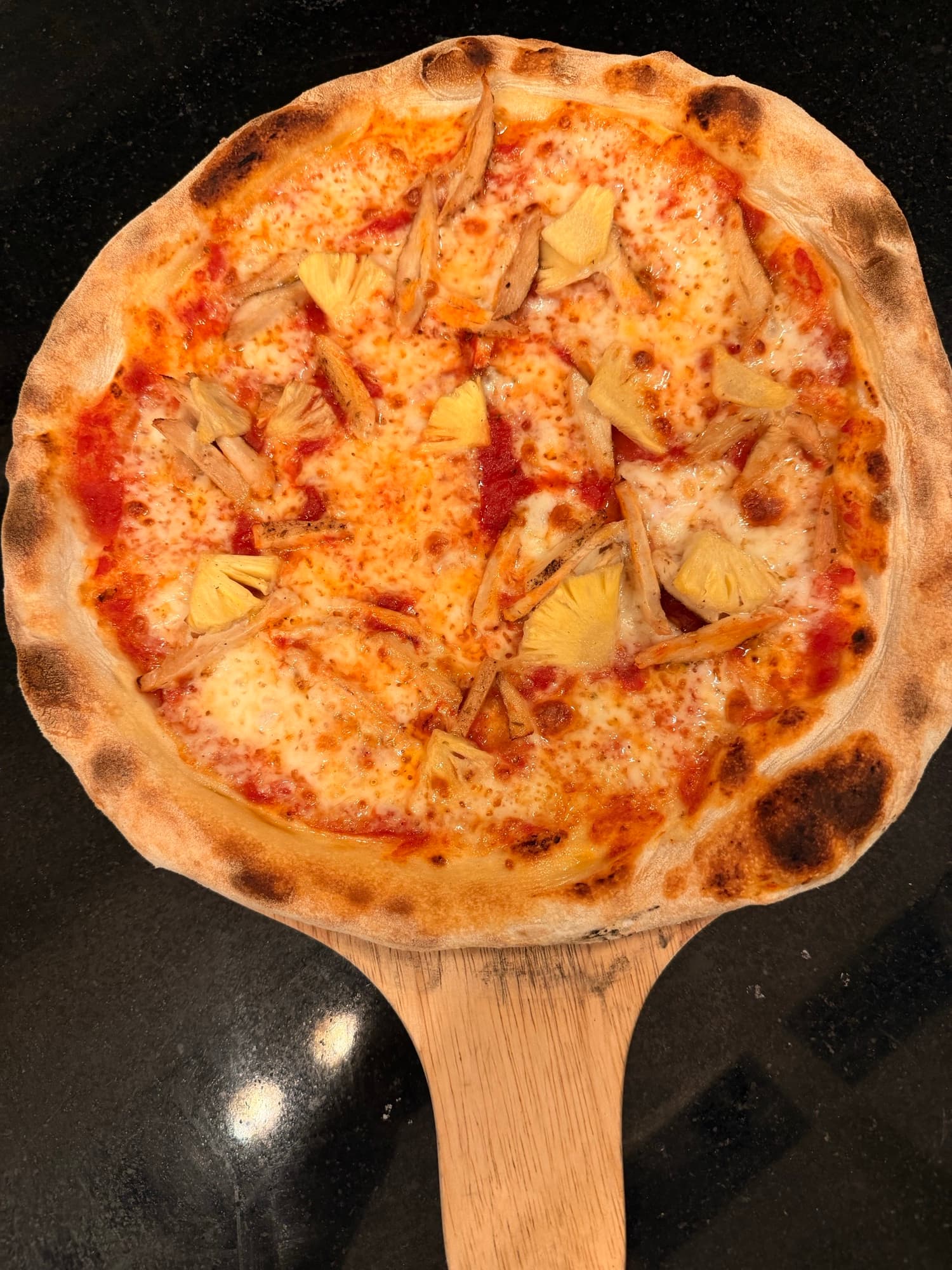 Wood-fired pizza fresh from the oven