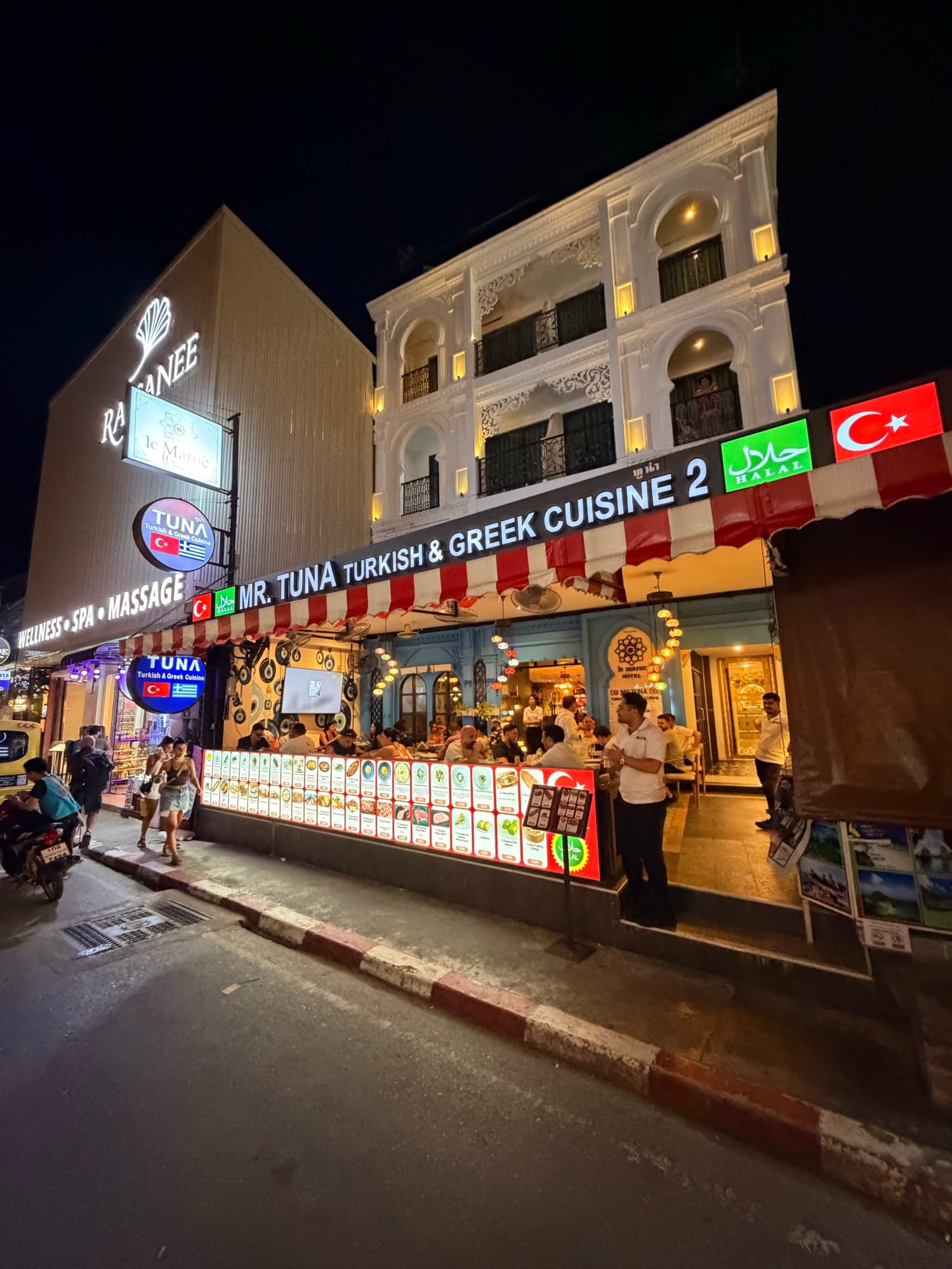 Mr. TUNA Turkish & Greek Cuisine lit up at night on Thaweewong Road, Patong