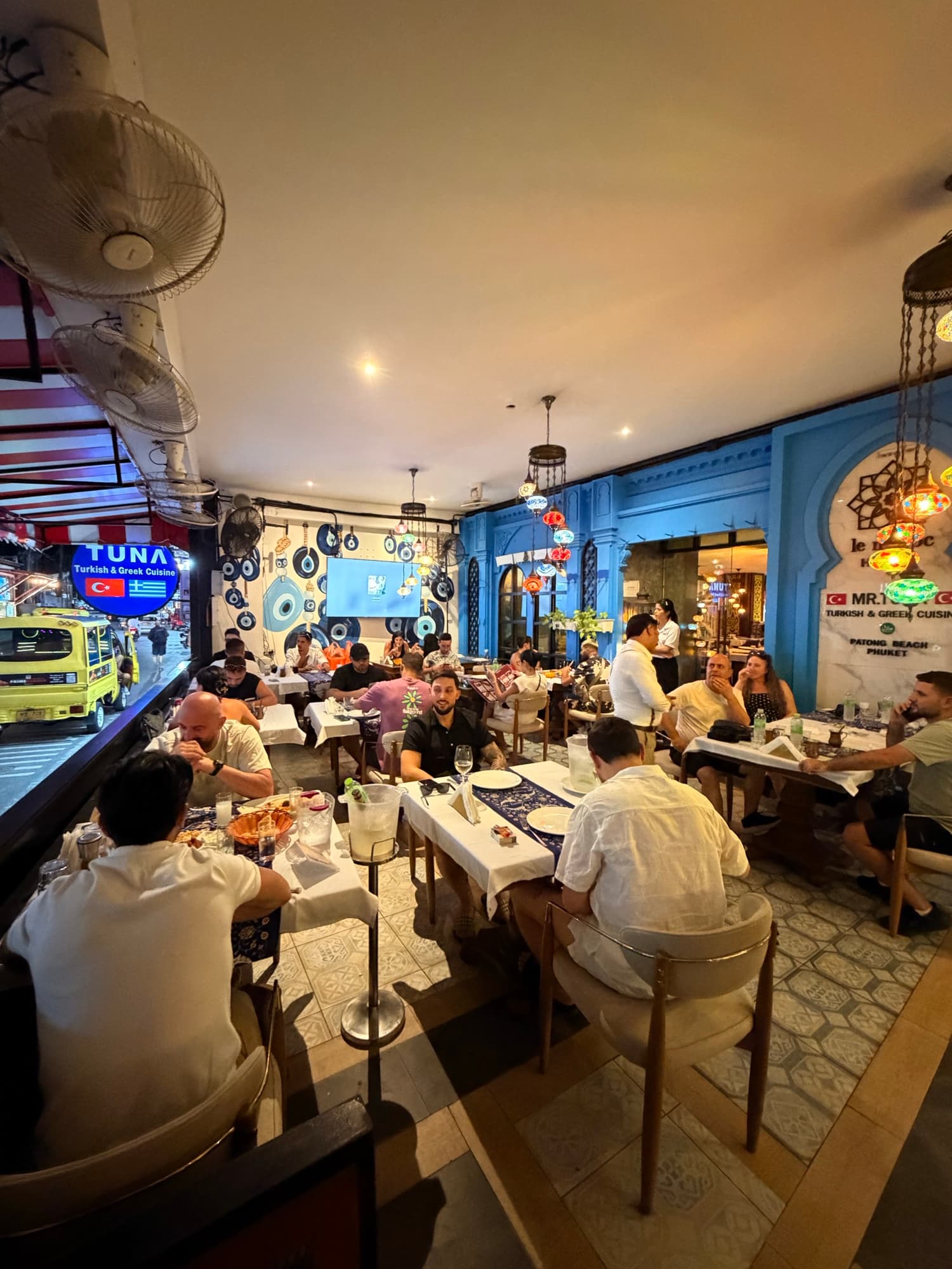 The dining room at Mr. TUNA Turkish & Greek Cuisine on a busy evening